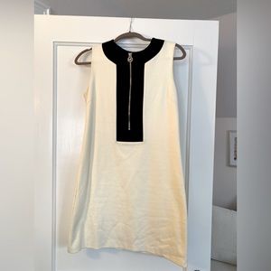 Michael Kors sleeveless off white colored dress w black zipper detail. Size S.